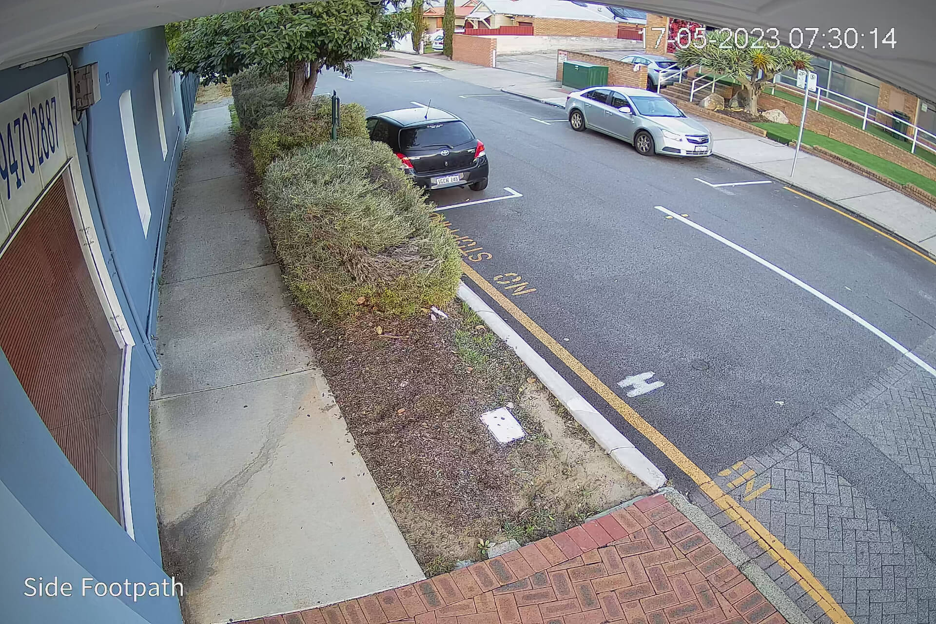 Security camera footage of a footpath in early morning